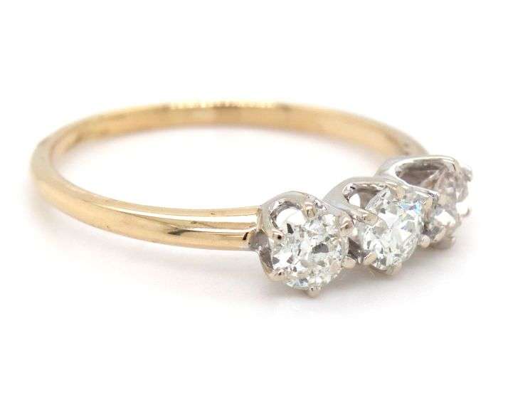14kt Yellow gold 0.69ctw 3 stone diamond band