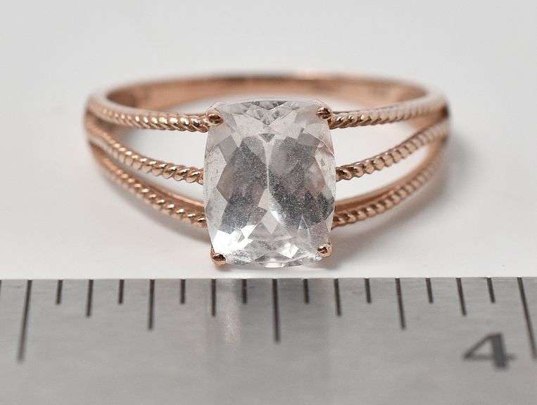 Beautiful 9K Rose Gold Clear Gemstone Ring