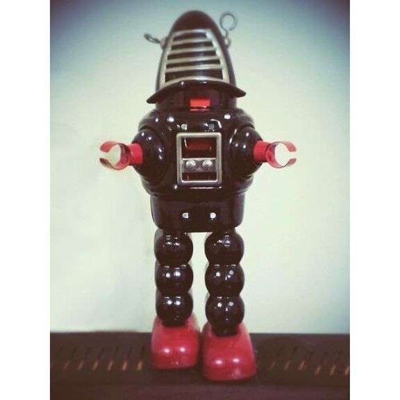 Sparking Planet Robot Wind-Up Tin Collector Series