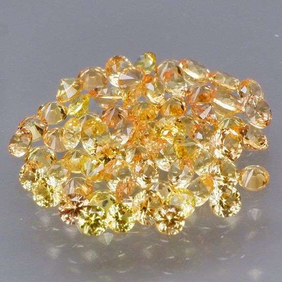 Fantastic 3.23ct diamond cut golden Sapphire set