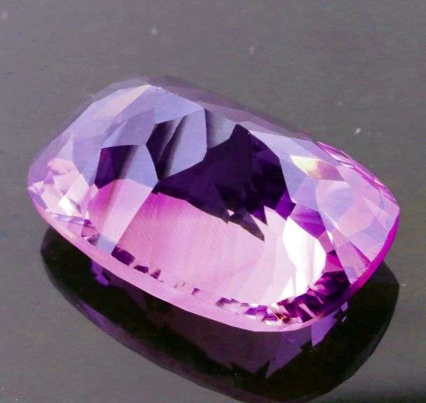 Concave flashing 12.22ct violet Amethyst
