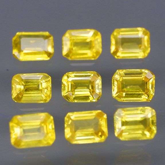 Incredible 2.04ct emerald cut yellow Sapphire set -Heated only!