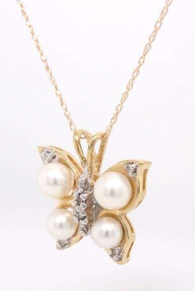 14kt Yellow gold pearl and diamond accent butterfly pendant on chain