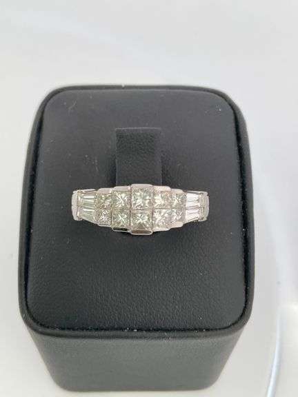 CERTIFIED PLATINUM AND DIAMOND RING.