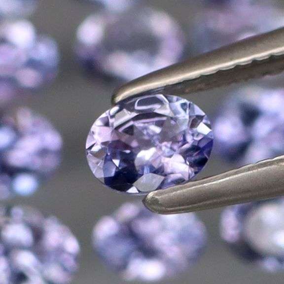 Heavy flashing! Untreated! 2.02ct oval cut Tanzanite set