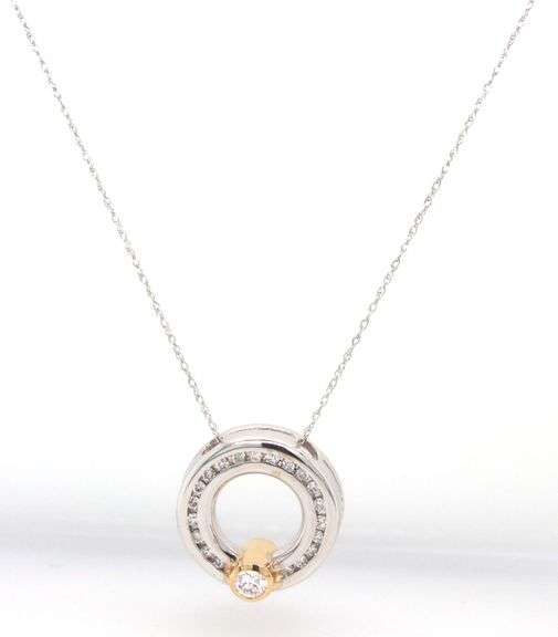 14kt White gold approximate 0.20ctw 2 tone circle diamond pendant on chain