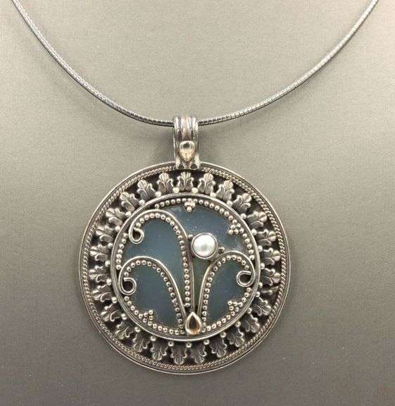Vintage 925 sterling silver sunburst pendant on chain