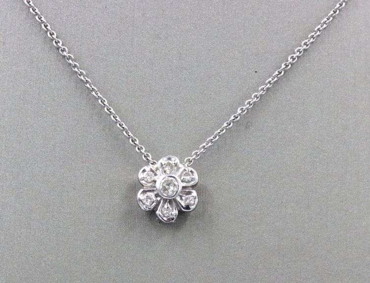 114kt White gold diamond flower style pendant on chain
