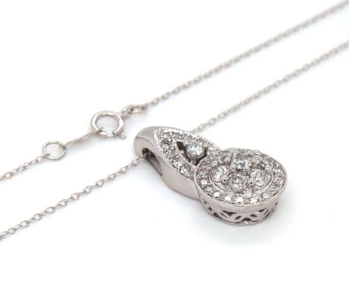 10kt White gold 0.85ctw diamond cluster pendant on chain