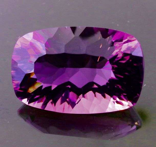 Concave flashing 12.22ct violet Amethyst