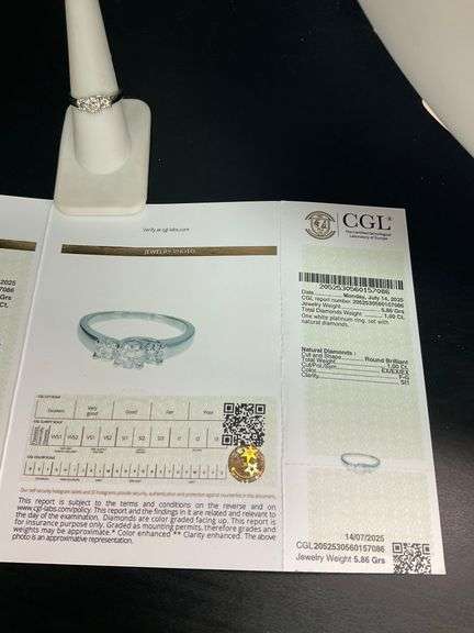 CERTIFIED LADIES PLATINUM AND DIAMOND RING