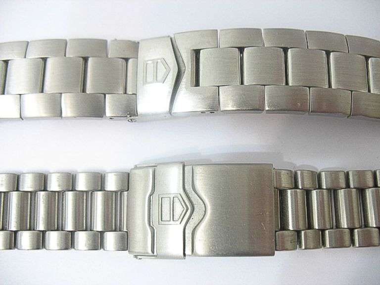 CONTENT OF SAFE DEPOSIT BOX. A PAIR OF TAG HEUER FORMULA AND KIRIUM WATCH BANDS