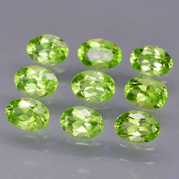 Dazzling 7.14ct untreated apple green Peridot set!