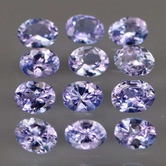 Heavy flashing 2.22ct oval cut Tanzanite set