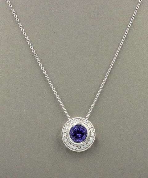 14kt White gold 2.02ct Tanzanite in 0.40ctw diamond halo setting pendant on chain