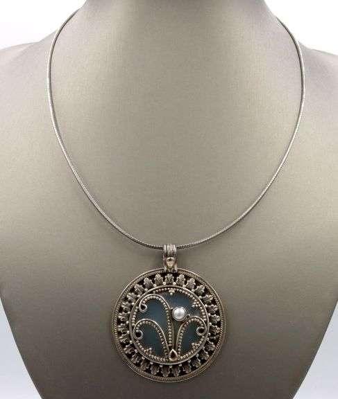 Vintage 925 sterling silver sunburst pendant on chain