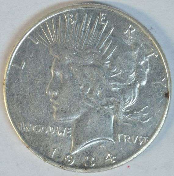 Fully struck better date 1934-P Peace Silver Dollar. Cleaned Unc.