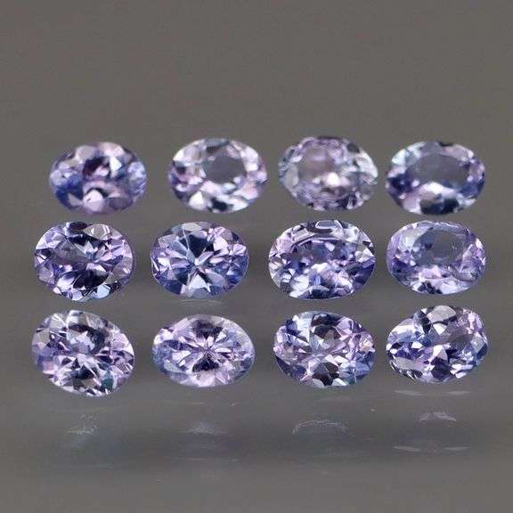 Heavy flashing! Untreated! 2.02ct oval cut Tanzanite set