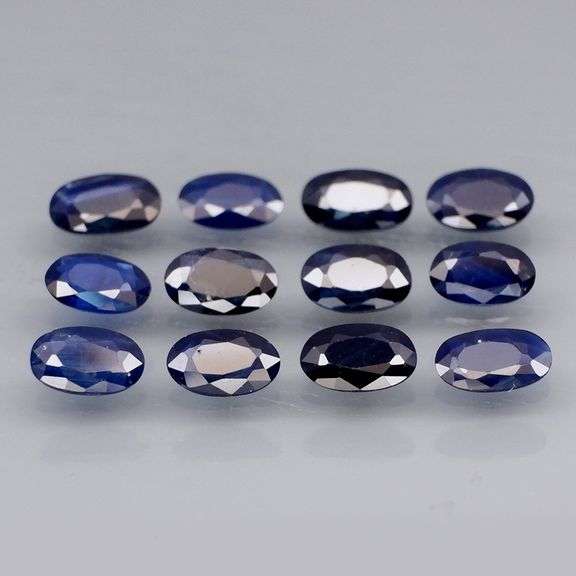 Beautifully colored 3.30ct ink blue Sapphire set