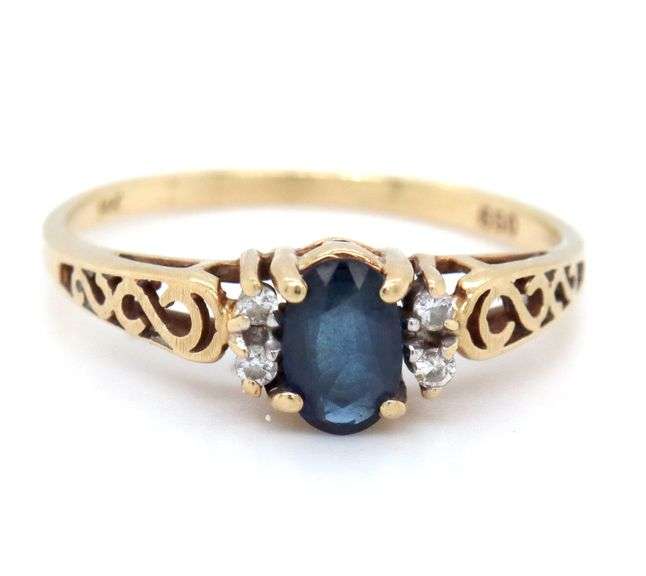 14kt Yellow gold oval blue sapphire and diamond ring