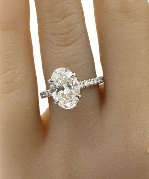 14kt White gold 3.15ct oval lab grown diamond in micro pave ring
