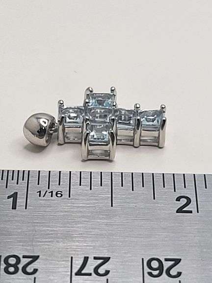 Over 5ctw sky blue Topaz on 14k white gold  cross pendent