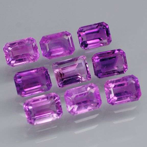 Glittering 8.58ct emerald cut Bolivian Amethyst set