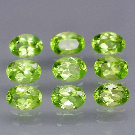 Dazzling 7.14ct untreated apple green Peridot set!