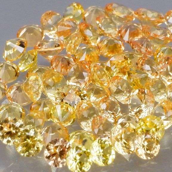 Fantastic 3.23ct diamond cut golden Sapphire set