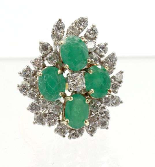 Vintage 18kt white gold emerald and diamond cocktail ring
