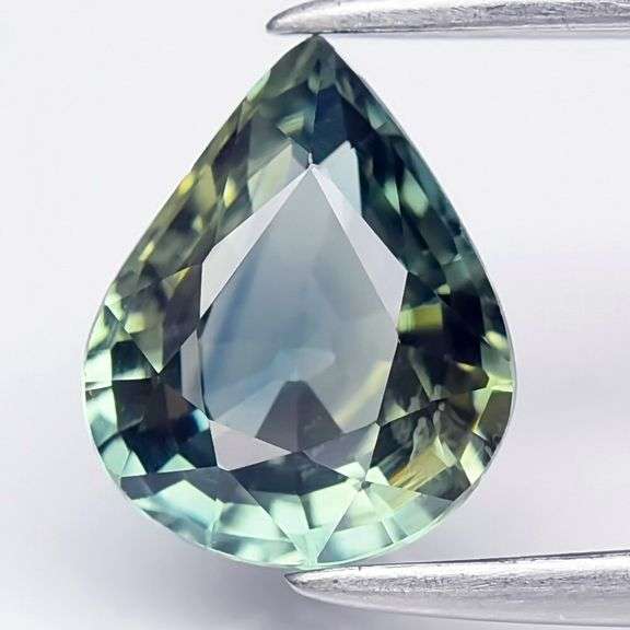 Heated only! .88ct VVS pear cut blue green Sapphire!
