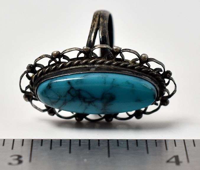 Turquoise Ring with Ornamental Housing in Sterling Silver