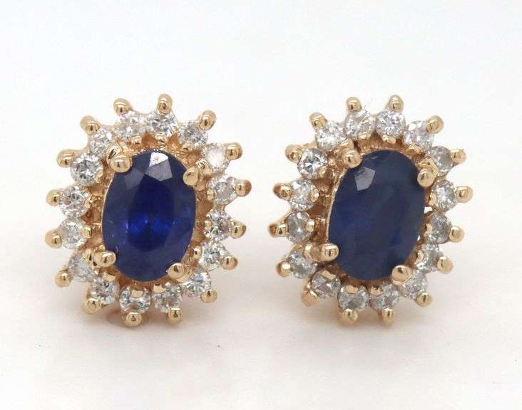14kt Yellow gold oval blue sapphire halo diamond stud earrings