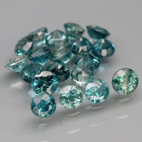 Heated only! 3.09ct blue green Sapphire set