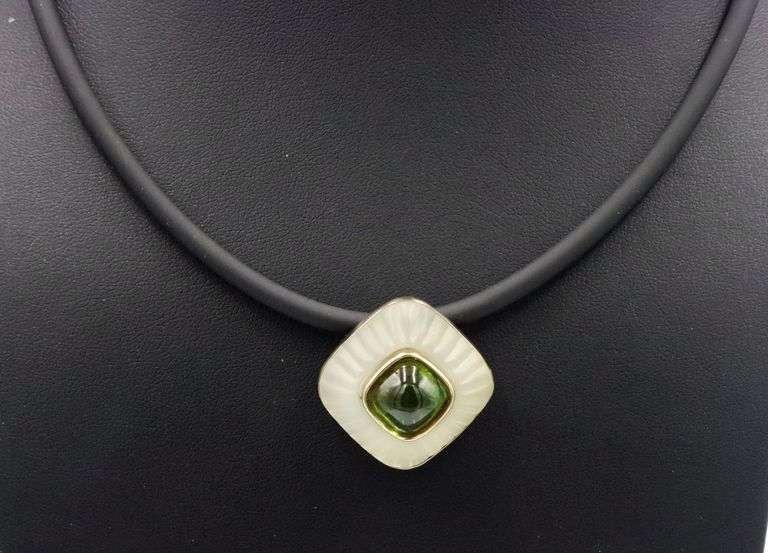 Cushion cut green tourmaline and rock crystal pendant on black leather cord