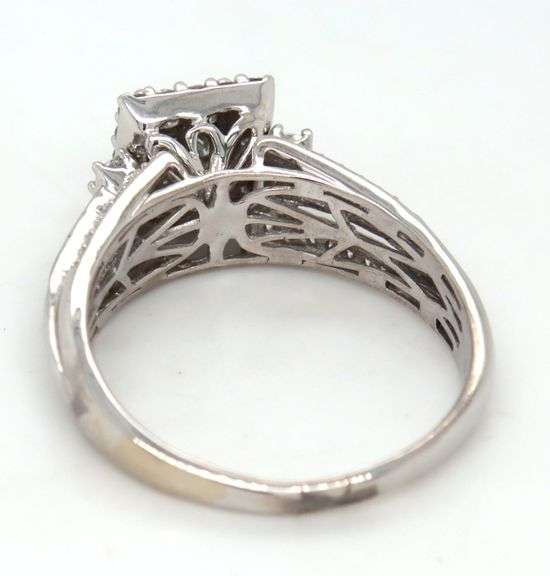 10kt White gold Invisible set diamond engagement ring