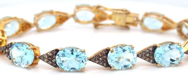 Fabulous 18.67CTW Oval Faceted Blue Topaz & Diamond Bracelet in 14K Yellow Gold Over Sterling Silver