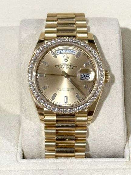 NEW! All original, Rolex Day-Date President 36mm – 18K Yellow Gold with Champagne Dial & Baguette Diamond Markers