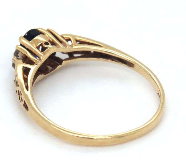 14kt Yellow gold oval blue sapphire and diamond ring