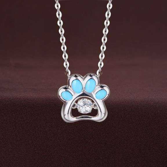 Cute Dog paw center stone pendant in solid sterling silver.with blue enamel in