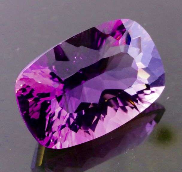 Concave flashing 12.22ct violet Amethyst