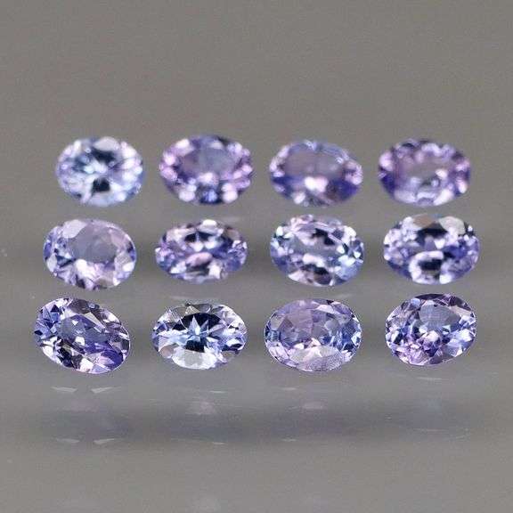 Heavy flashing 2ct oval cut Tanzanite set
