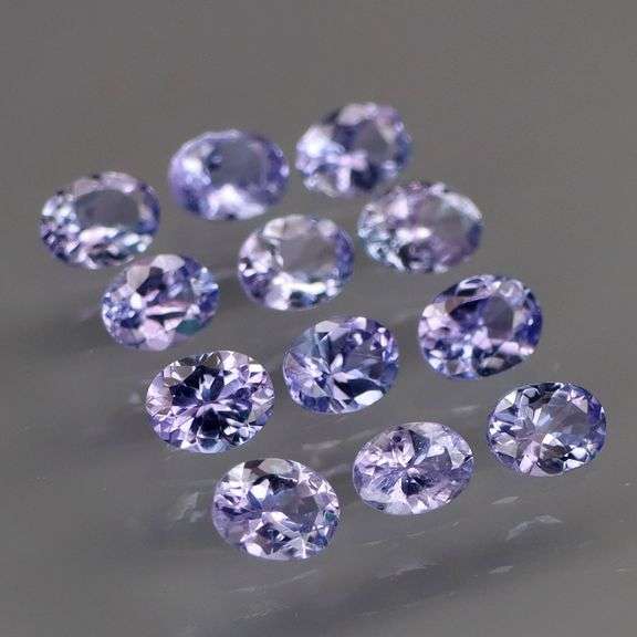 Heavy flashing 2.22ct oval cut Tanzanite set