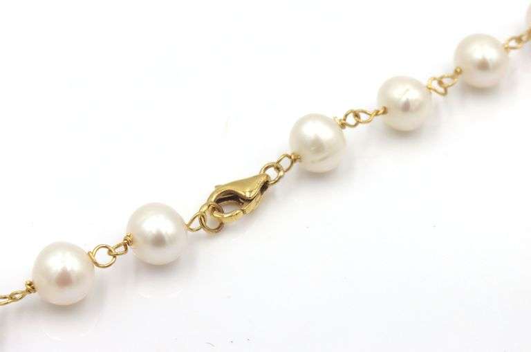 18kt Yellow gold 6.5-7mm fresh water pearl and gold station leaf dangle necklace