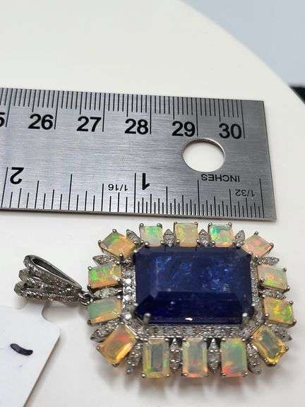 Exquisite 36ct Tanzanite with 1.21ct Natural Diamonds & 14 Rare Opals in silver pendent