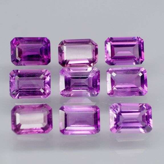 Glittering 8.58ct emerald cut Bolivian Amethyst set