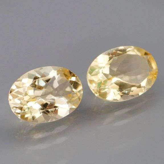 Glittering 10.70ct 14x10mm pair of golden yellow Citrines!