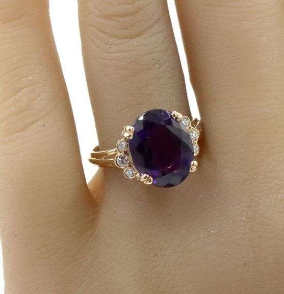 14kt Yellow gold oval amethyst and diamond ring