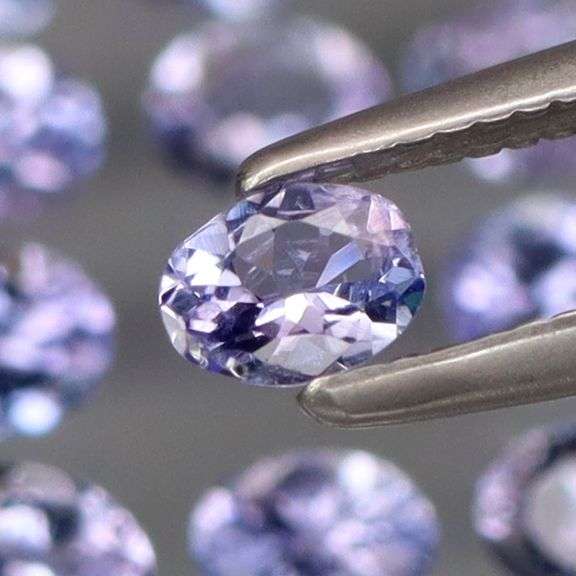 Heavy flashing 2.22ct oval cut Tanzanite set