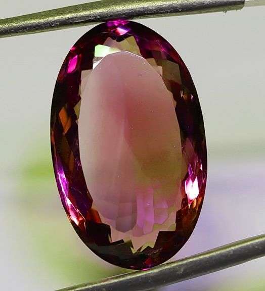 Substantial oval cut 19.58ct violet Amethyst